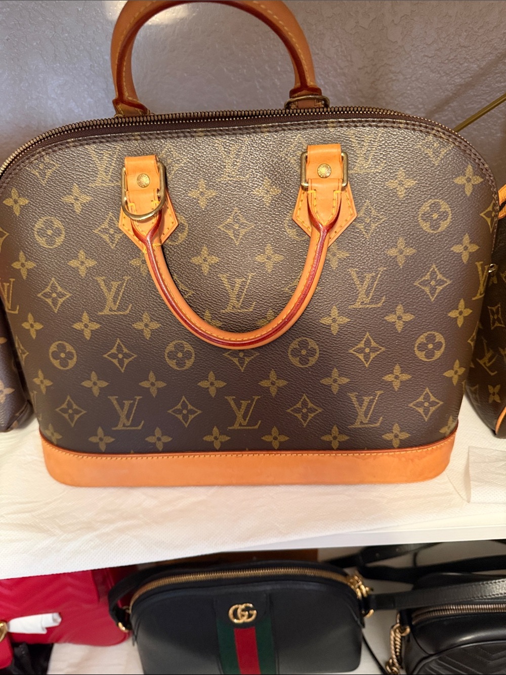 Louis Vuitton Monogram Alma Satchel in Brown & Tan Leather Trim